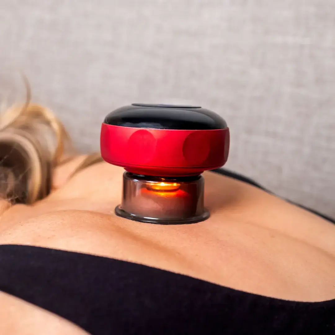ELVORAPRO Smart Cupping Massager™ in use on back, providing soothing relief through modern cupping therapy.